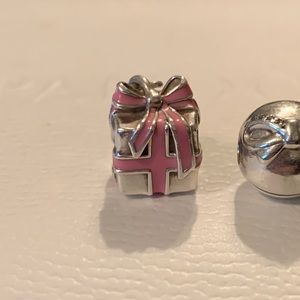Authentic Pandora pink present charm.